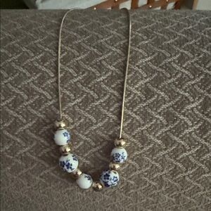 Elegant Gold and Blue Bead Necklace
